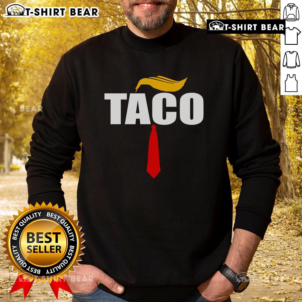 Hot Taco Trump Hair Tie Sweatshirt featuring a vibrant taco design and fun Trump-inspired graphics.