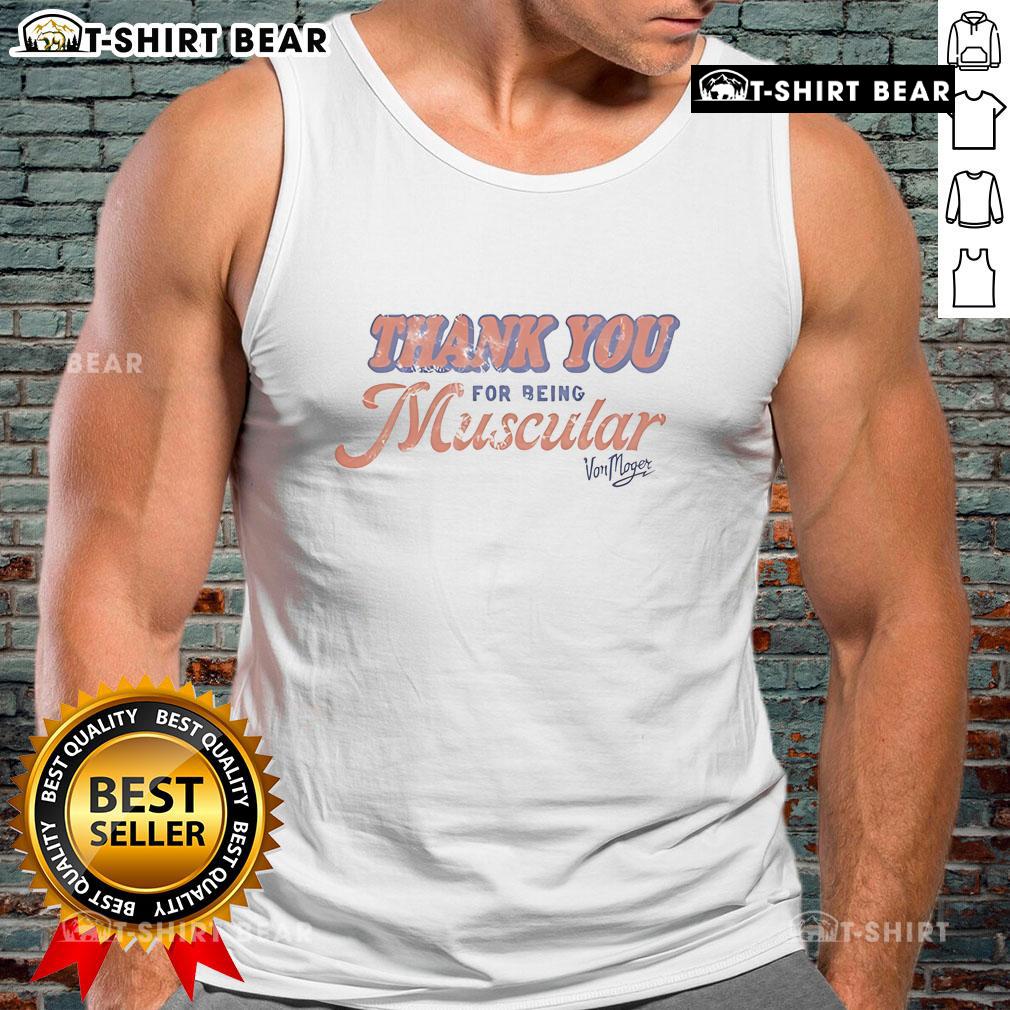 Alt Text: Calum Von Moger wearing a muscular tank top, showcasing his impressive physique and fitness lifestyle.