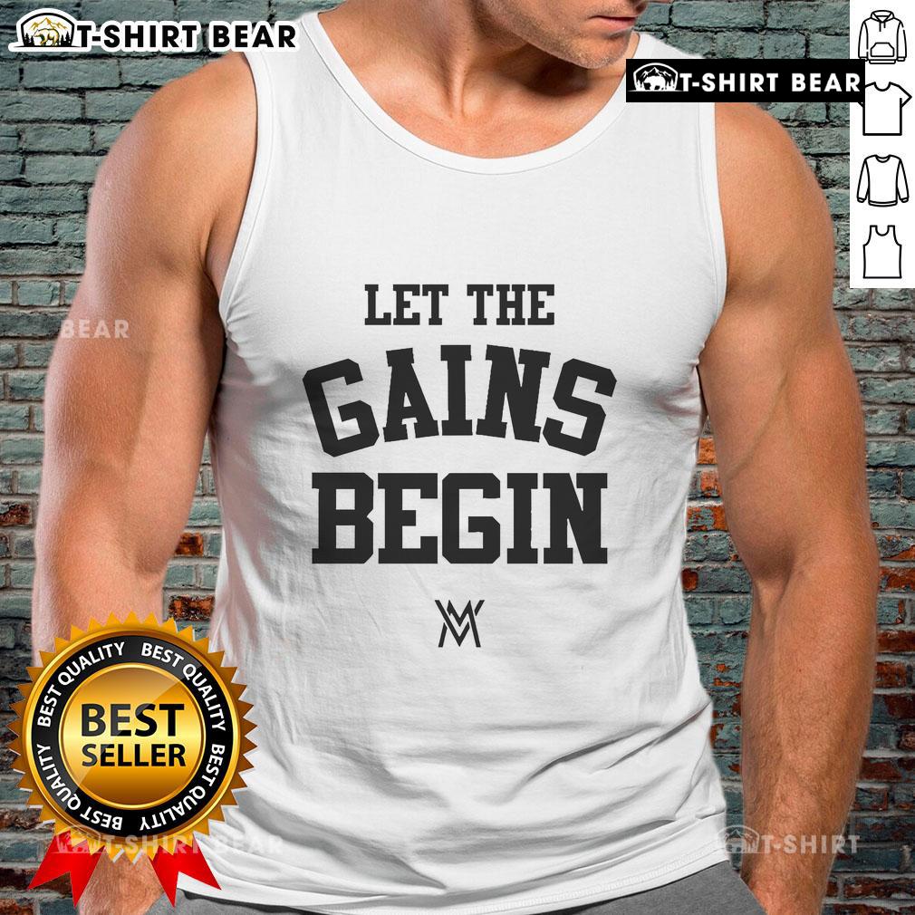 Alt Text: Calum Von Moger wearing 'Let The Gains Begin' tank top, showcasing fitness style and motivation for gym enthusiasts.