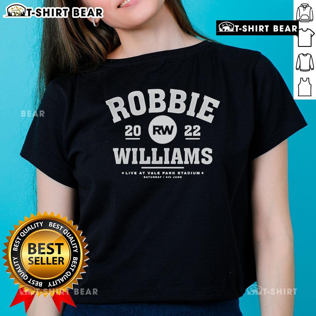 Robbie Williams performing live at Vale Park Stadium on June 4th, 2023, in a stylish ladies' tee.