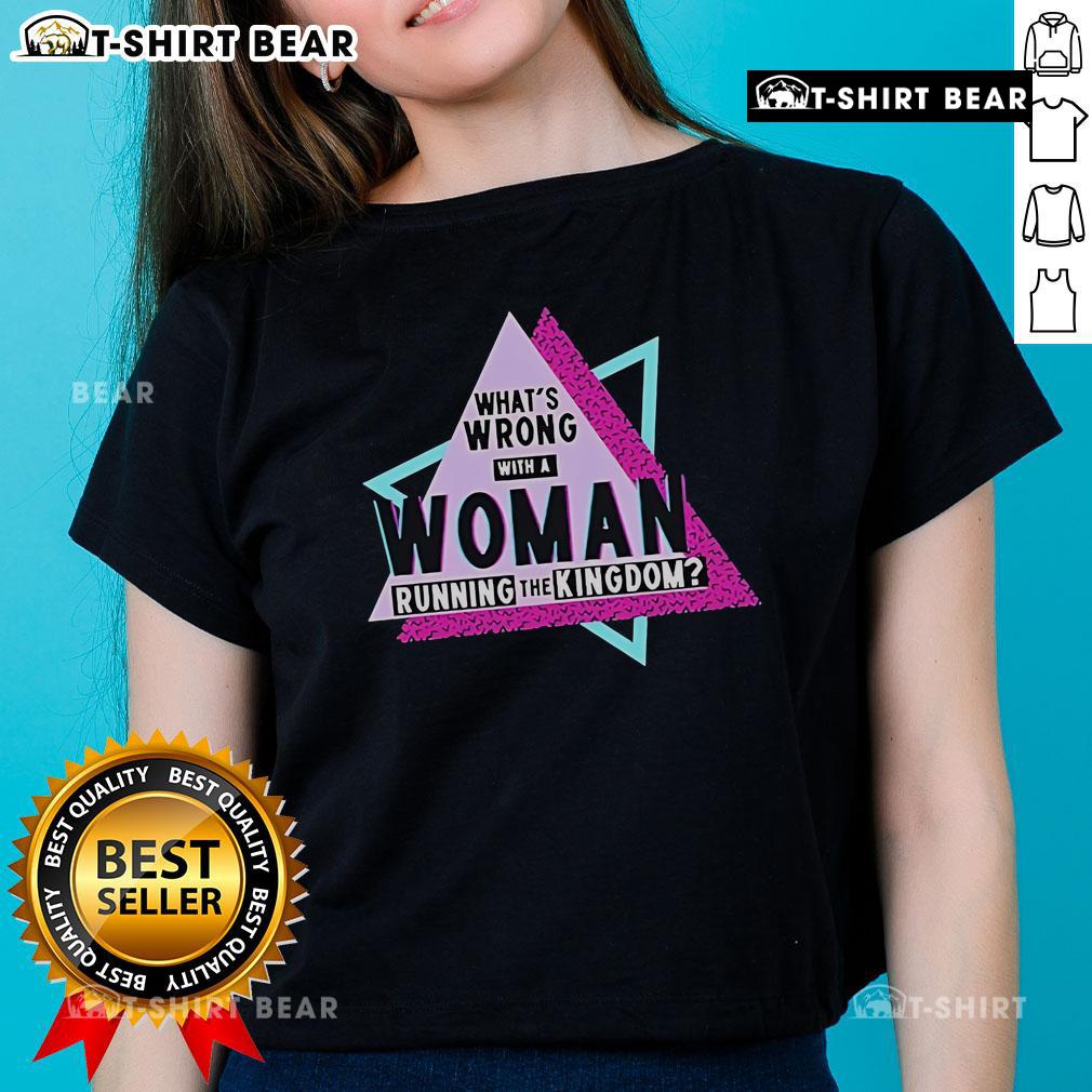 Alt Text: Original Courtney Reed What's Wrong With A Woman Running The Kingdom Ladies Tee featuring bold graphic design.