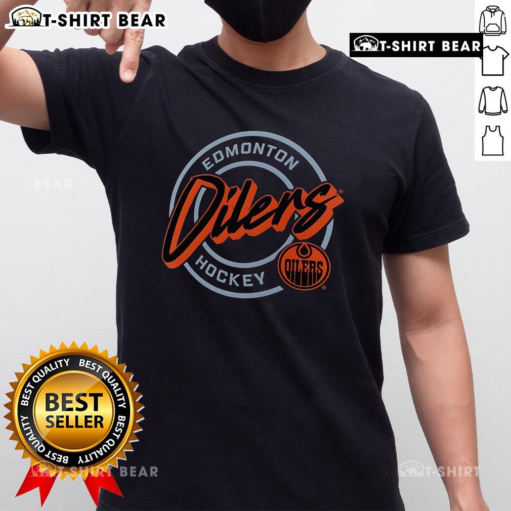 Premium Edmonton Oilers Hockey Colorblock Puck Logo T-Shirt featuring vibrant team colors and logo, perfect for fans.