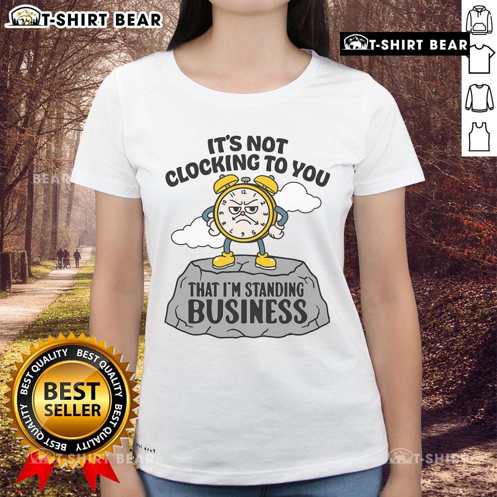 Alt Text: Woman wearing 'Premium It's Not Clocking To You That I'm Standing On' business ladies tee, showcasing stylish professional attire.