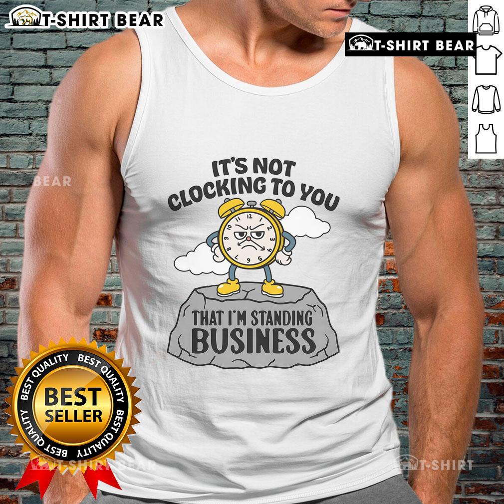 Alt Text: Woman wearing a 'Premium It's Not Clocking To You' business tank top, showcasing stylish and bold fashion statement.