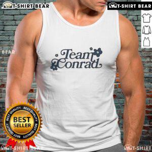 Alt Text: Stylish Pretty Team Conrad tank top featuring a vibrant design, perfect for casual summer outfits.