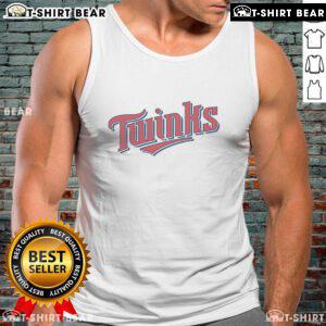 Two stylish twin twinks wearing matching tank tops, showcasing their trendy summer fashion in a vibrant outdoor setting.