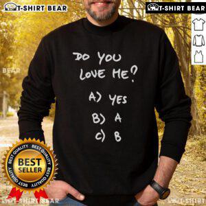 Alt Text: Top Franco Mastantuono wearing Do You Love Me sweatshirt, showcasing trendy streetwear style and vibrant design.
