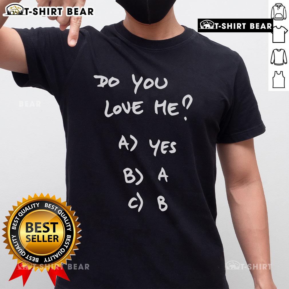 Alt Text: Top Franco Mastantuono wearing a Do You Love Me t-shirt, showcasing his trendy style and artistic flair.