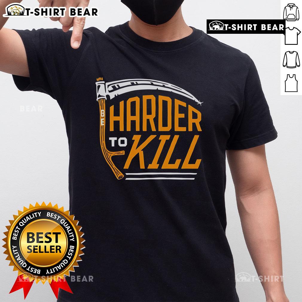 Top Harder To Kill T-Shirt featuring bold graphics and a stylish design for fitness enthusiasts and fans of motivational apparel.