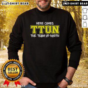 Cozy 'Here Comes Ttun' sweatshirt featuring a northern-themed design, perfect for team spirit and casual wear.