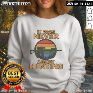 Cozy LGBT sweatshirt with 'Top It Was Never About Hunting' slogan, perfect for pride events and casual wear.