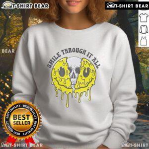 Cozy Top Skull Smile Through It All Sweatshirt featuring a unique skull graphic, perfect for casual wear and self-expression.