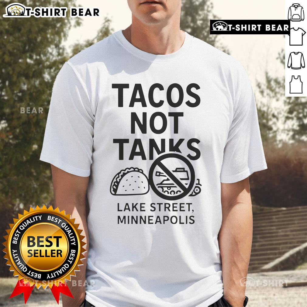 Top Tacos Not Tanks Lake Street Minneapolis T-Shirt featuring a vibrant design celebrating local cuisine and community spirit.