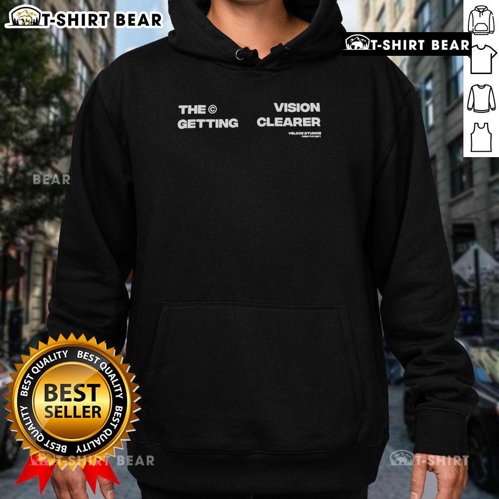 Top-The-Getting-Vision-Clearer hoodie from Veloce Studios Creative Dept, showcasing unique design and vibrant colors.