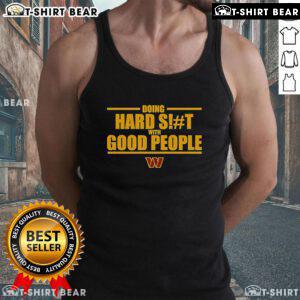 Top Washington Commanders tank top featuring bold design, perfect for fans who love hard work and community spirit.