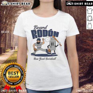 Carlos Rodon in a New York Yankees tee, showcasing his beard during mid-summer baseball season.
