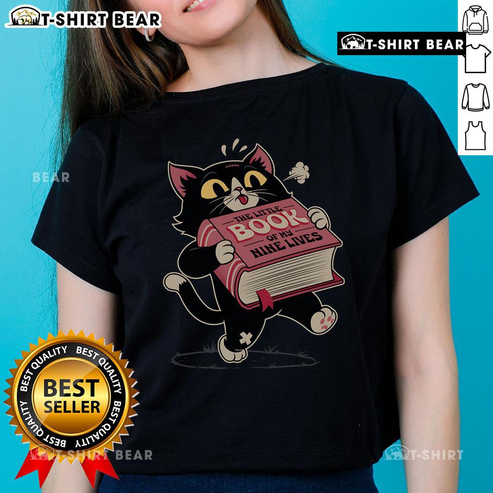 Cute cat graphic on 'The Little Book of My Nine Lives' ladies tee, perfect for cat lovers and stylish outfits.