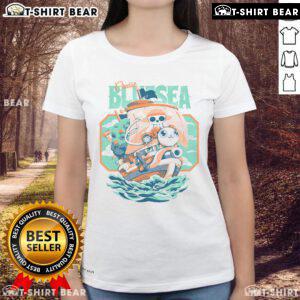 Cute Monkey D. Luffy from One Piece on a blue sea cruise, perfect for ladies' tee fans of the anime series.