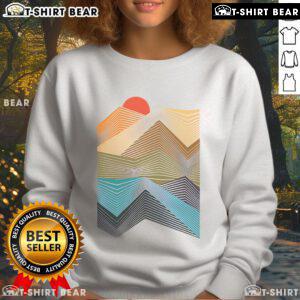 Geometric mountain sunset sweatshirt design featuring vibrant colors and a serene landscape, perfect for outdoor enthusiasts.