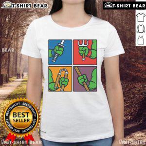 Official Ninja Turtles Weapons Ladies Tee featuring vibrant graphics of iconic weapons from the beloved TMNT series.