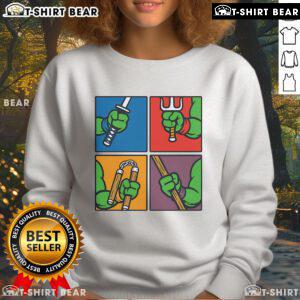 Official Ninja Turtles Weapons Sweatshirt featuring iconic designs and vibrant colors for fans of the classic series.
