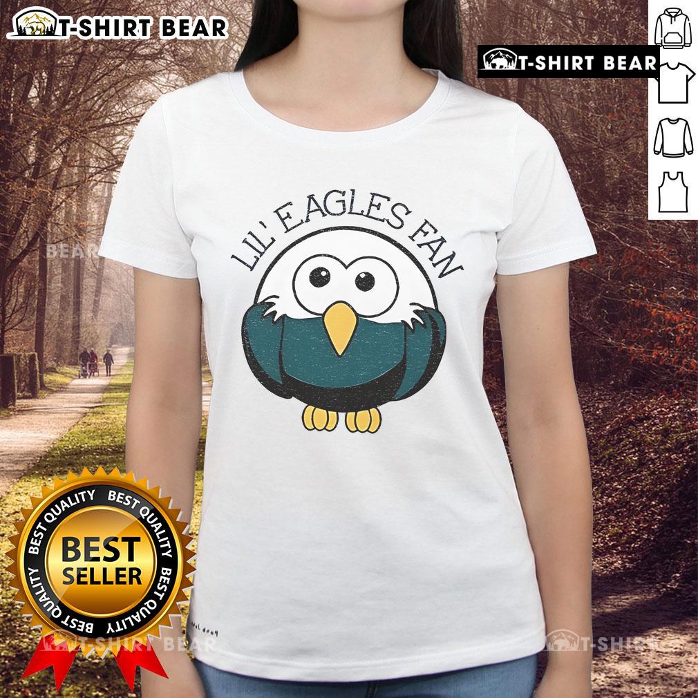 Adorable young fan in an Official Philadelphia Eagles NFL Football tee, showcasing team spirit and love for sports.