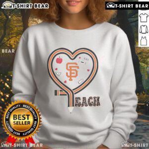 Official San Francisco Giants baseball sweatshirt with a love teaching heart design and pencil graphics.