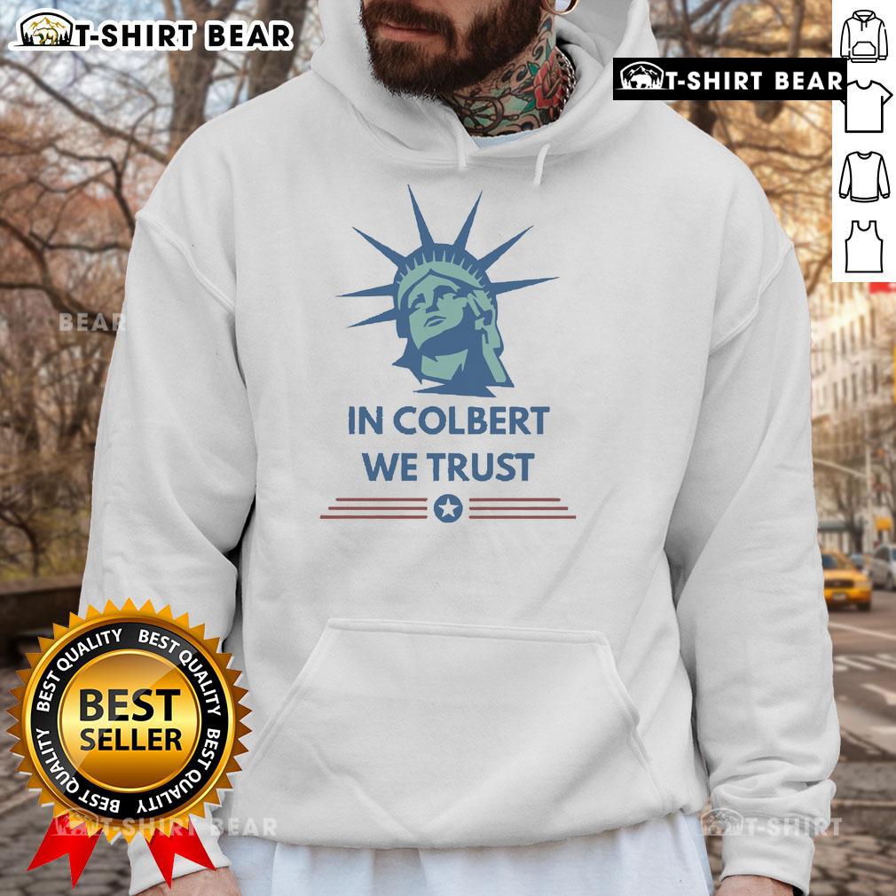 Alt Text: Official Stephen Colbert In Colbert We Trust hoodie featuring bold lettering and a stylish design for fans.