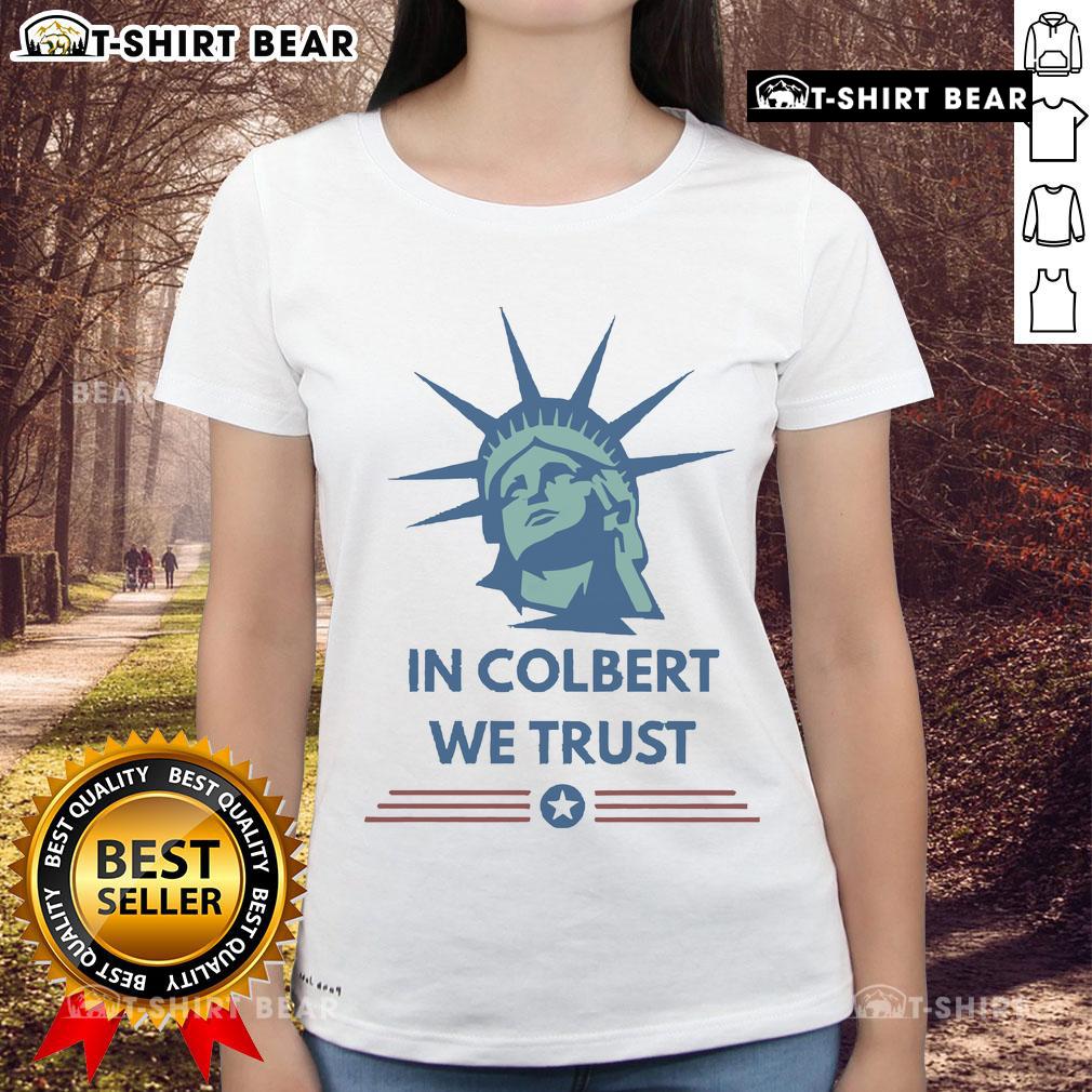 Alt Text: Official Stephen Colbert In Colbert We Trust Ladies Tee featuring bold text design on a stylish women's t-shirt.