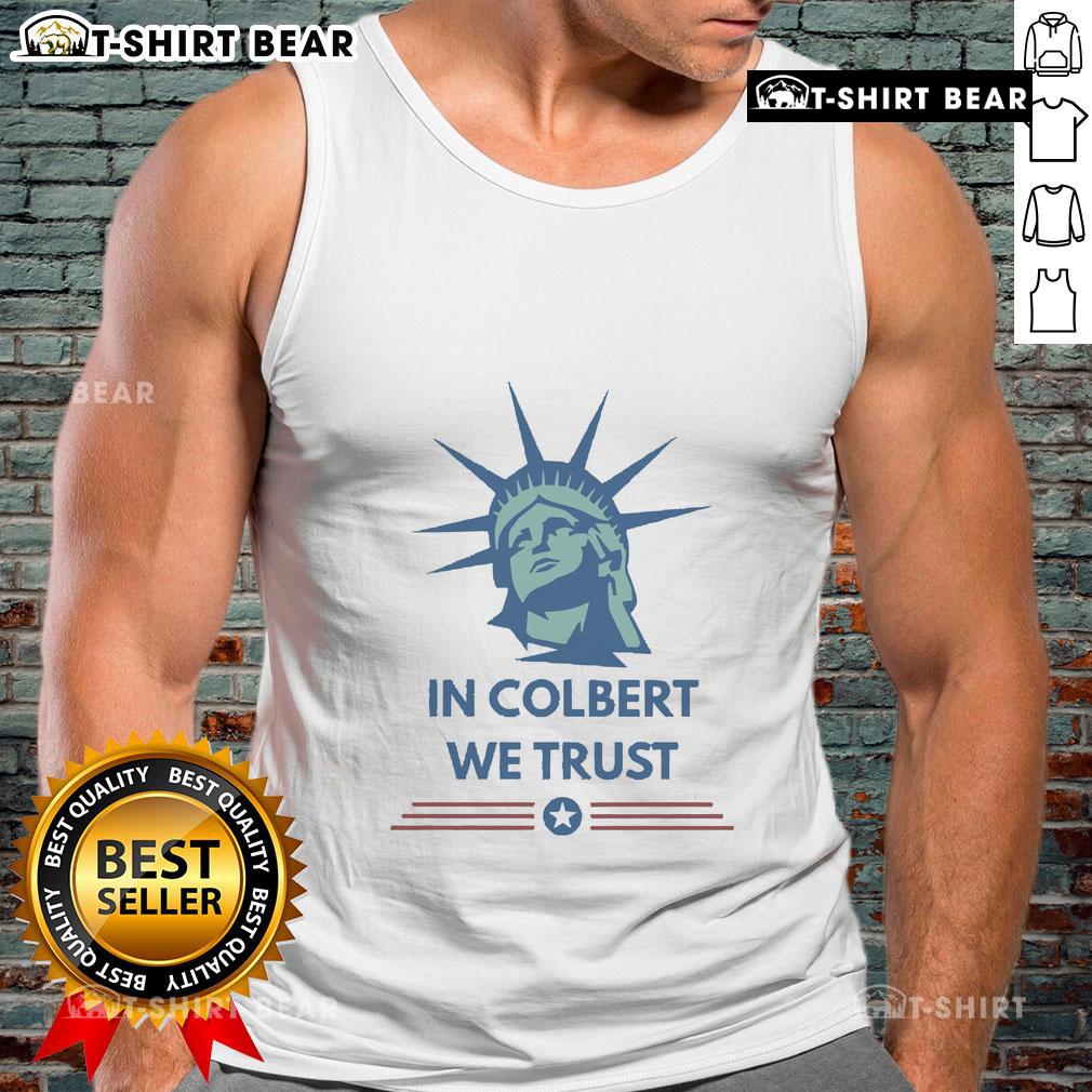 Official Stephen Colbert In Colbert We Trust tank top featuring bold text design and vibrant colors for fans.