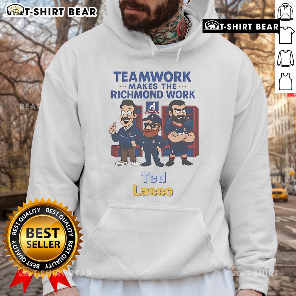 Alt Text: Official Ted Lasso Teamwork Makes The Richmond Work hoodie featuring the show's logo and motivational design.