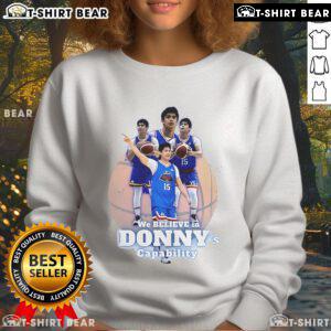 Alt Text: Official We Believe in Donny's Capability Sweatshirt featuring bold text and a comfortable design, perfect for casual wear.