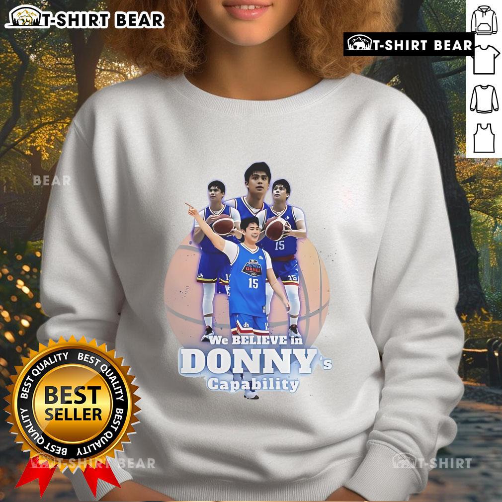 Alt Text: Official We Believe in Donny's Capability Sweatshirt featuring bold text and a comfortable design, perfect for casual wear.