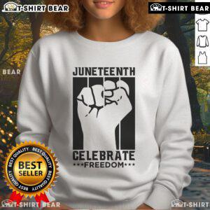 Alt Text: Premium Juneteenth Celebrate Freedom Fist Sweatshirt featuring a bold design celebrating freedom and unity.