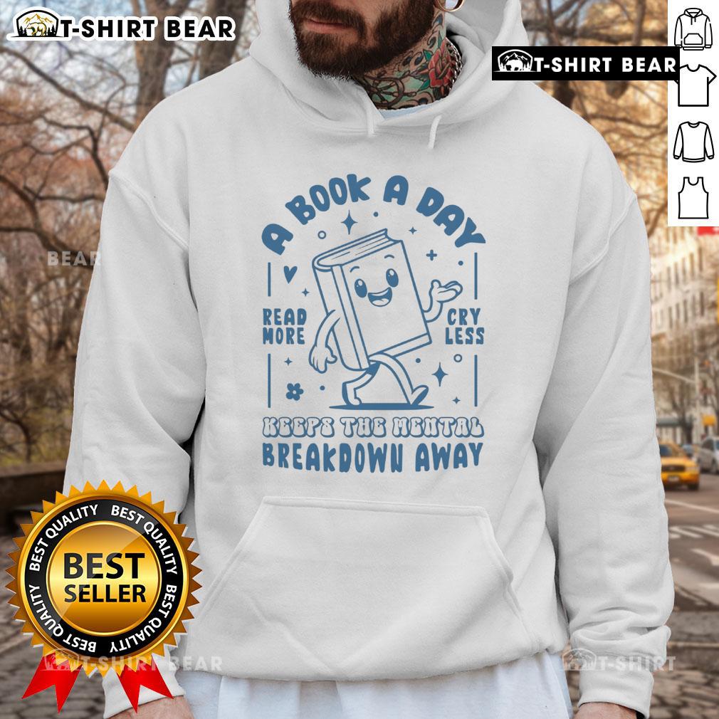Cozy hoodie with A Book A Day Keeps The Mental Breakdown Away design, perfect for book lovers and self-care enthusiasts.