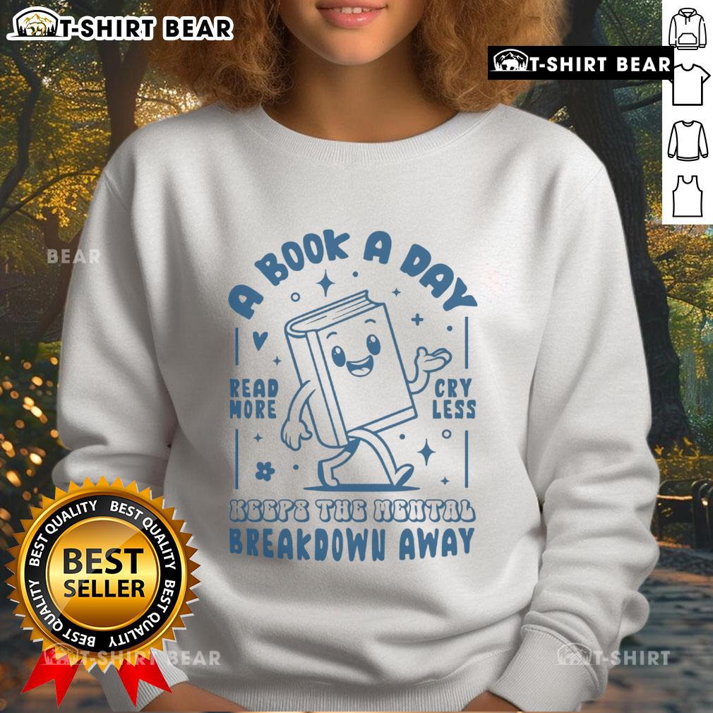 Cozy sweatshirt featuring 'A Book A Day Keeps The Mental Breakdown Away' design, perfect for book lovers and comfort seekers.