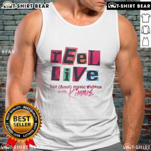 Alt Text: Kimmie in a stylish tank top during a vibrant live music video shoot for Pretty Reel Live With Hot Not.