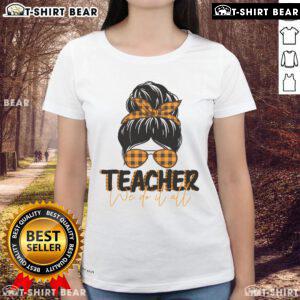 Pretty teacher wearing a messy bun in a stylish 'We Do It All' ladies tee, perfect for classroom or casual wear.