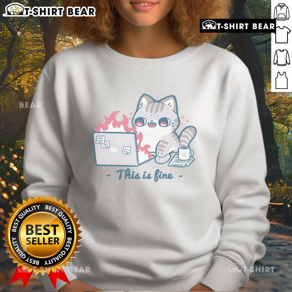 Cute cat in a cozy 'This Is Fine' sweatshirt, perfect for cat lovers seeking stylish comfort.