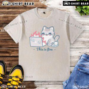 Cute cat wearing a washed T-shirt with 'This is fine' text, showcasing a humorous and relaxed vibe.