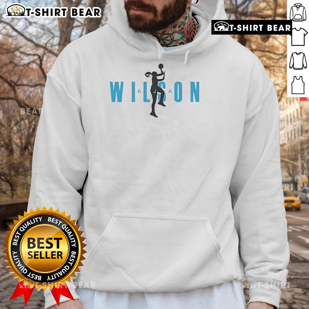 Alt Text: Aja Wilson statue displayed with a basketball hoodie, showcasing her iconic style and athletic prowess.