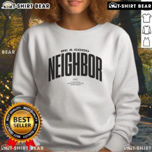 Cozy Buffalo sweatshirt with 'Be A Good Neighbor' slogan, perfect for casual wear and showing community spirit.
