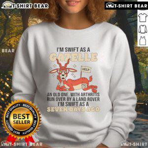 Cartoon goat in a sweatshirt saying 'I'm swift as a gazelle' humorously depicts an old goat with arthritis next to a Land Rover.