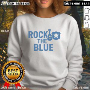 Top guitar and badge graphic on a stylish blue sweatshirt, perfect for music lovers and rock enthusiasts.