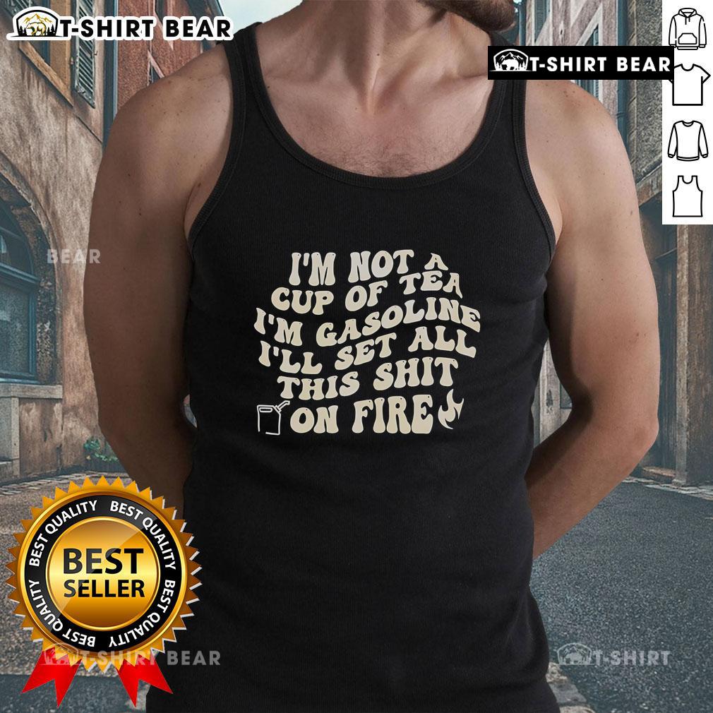 Black tank top with 'I'm Not A Cup Of Tea, I'm Gasoline' printed design, perfect for bold fashion statements.