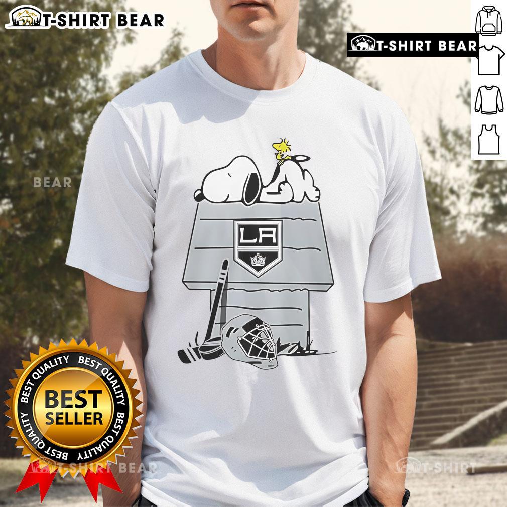 Los Angeles Kings NHL Hockey Snoopy Woodstock House T-Shirt featuring playful graphics and team colors, perfect for fans.
