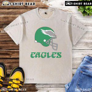 Alt Text: Top Philadelphia Eagles E-A-G-L-E-S pullover washed t-shirt for fans, featuring team logo and comfortable fit.