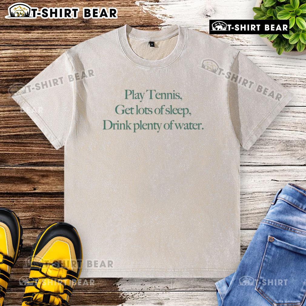 Top play tennis tips: stay hydrated and well-rested, featured on a washed T-shirt design.
