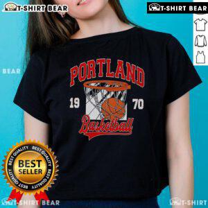 Vintage 1970s ladies tee featuring a Portland basketball graphic, perfect for retro sports enthusiasts.