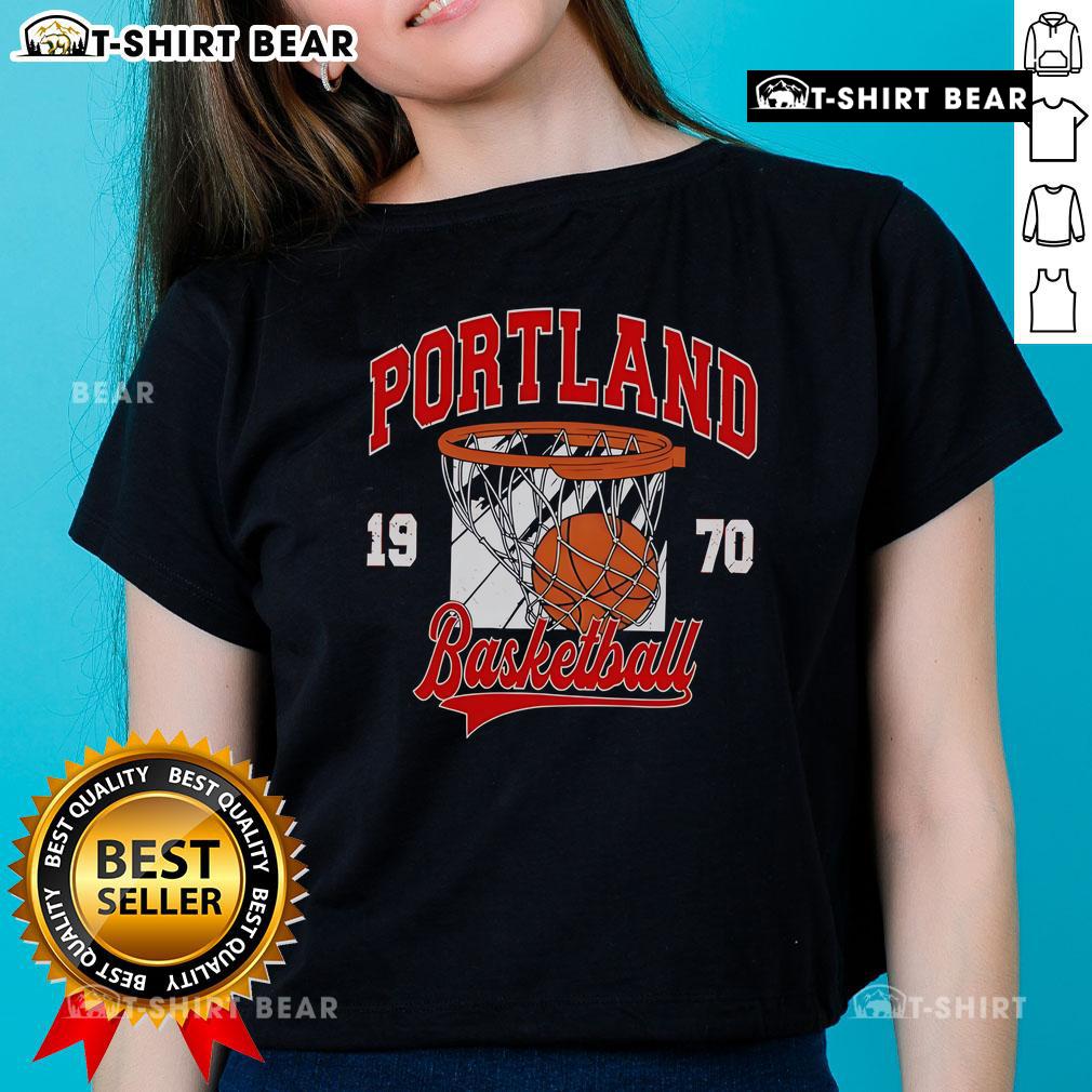 Vintage 1970s ladies tee featuring a Portland basketball graphic, perfect for retro sports enthusiasts.